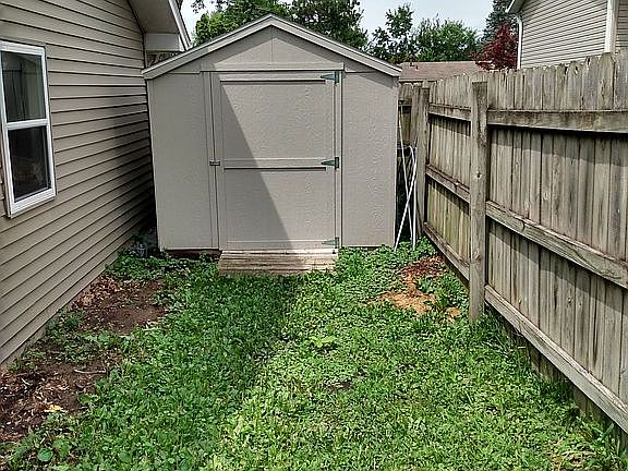 Shed behind garage