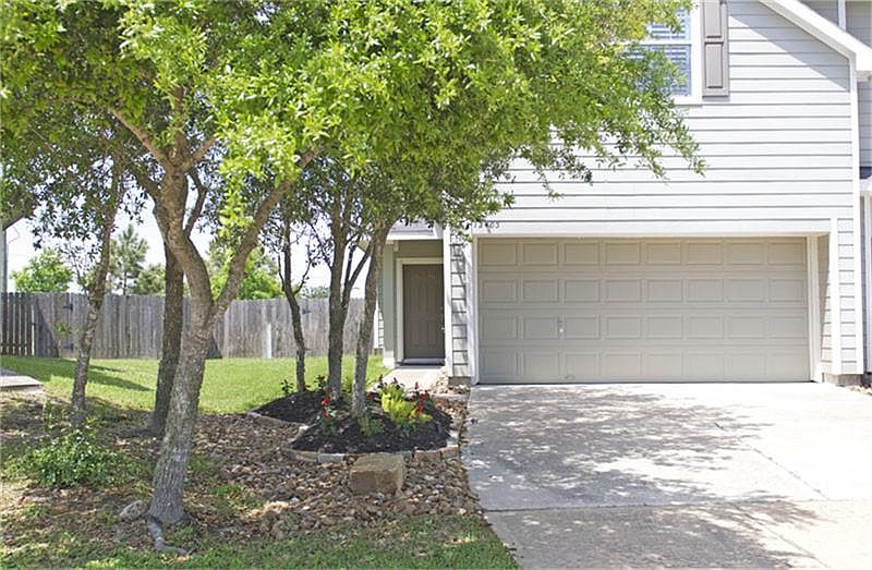 This town home is located on a pie shaped corner lot.