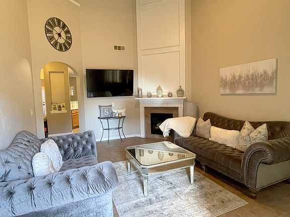 Large 2-story great room with fireplace.