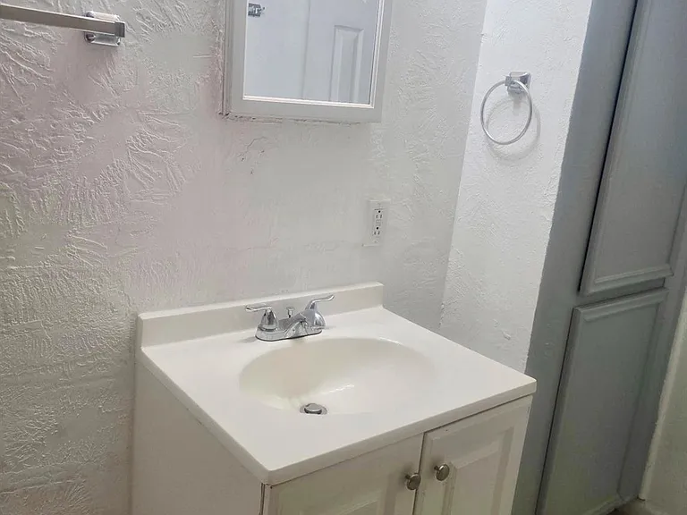 7702 Claiborne St — Photo 8