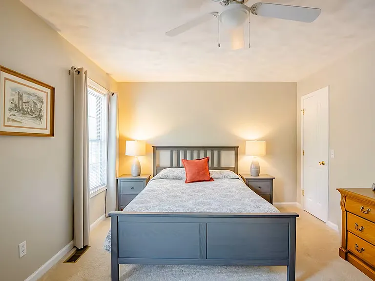 Front bedroom has queen sized bed with memory foam mattress, two dressers, two walk-in closets, 2 nightstands and chair. Linens provided.