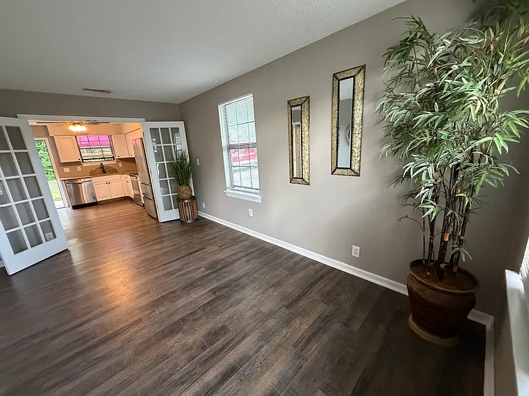 New hardwood floors though out and French Doors between Kitchen and LR