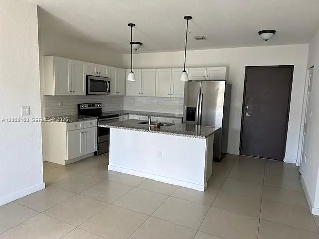 13381 SW 251st Ter #106 — Photo 2