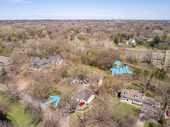 Beautiful sprawling Rambler on 1.25 Acre lot  backs to trail and also pond view in front  A great family-oriented home with everything for entertaining including outdoor patio, hot tub, yard game space, basketball court, & deck.