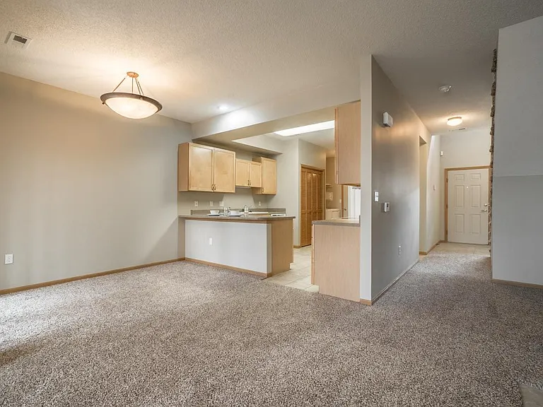 Open-concept layouts connect the kitchen and dining areas, providing a seamless space to relax or gather.