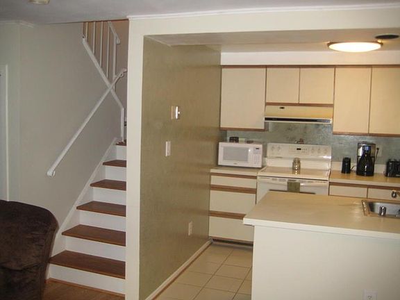Kitchen and stairs going to the second floor