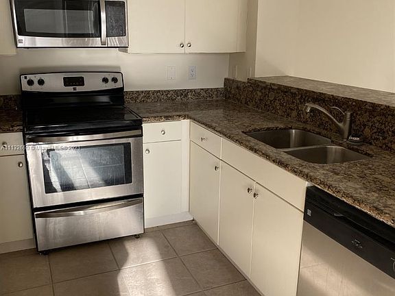 4th image of 1727 Village Blvd #324