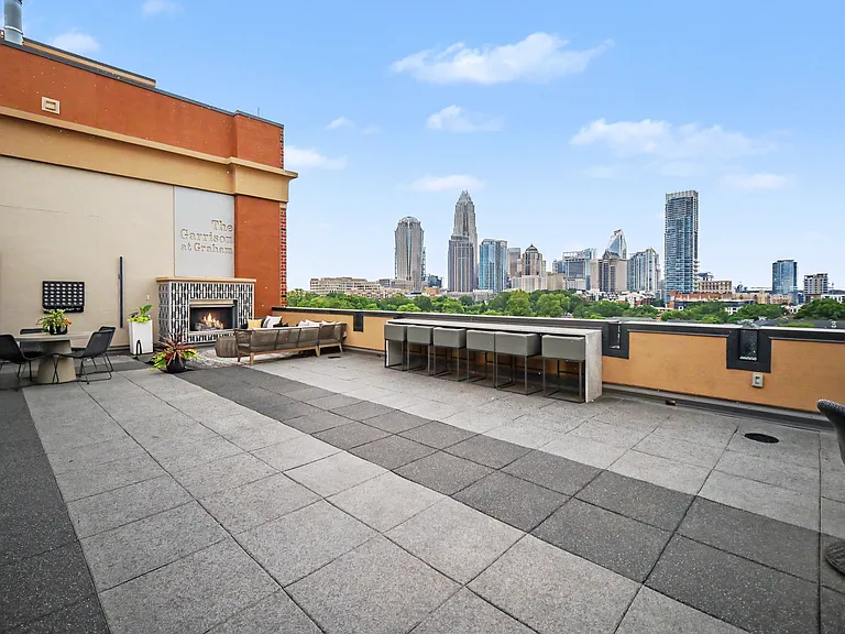 The community terrace has THE best views of the Uptown skyline, two fire places, a new grill and bar, and TVs. Perfect for hosting, can be rented through the HOA for private events