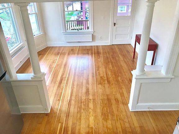 Living Room - Huge bay windows and access to Deck
