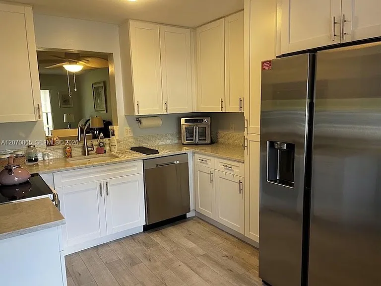 6936 Huntington Ln #103 — Photo 4