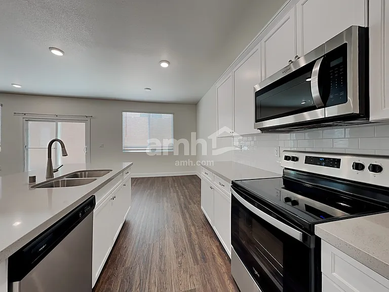 6031 Theodore St — Photo 3