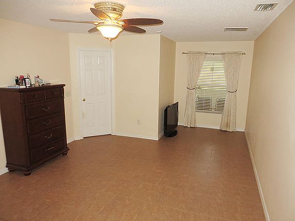 4th image of 6425 NW Cosmo Ct