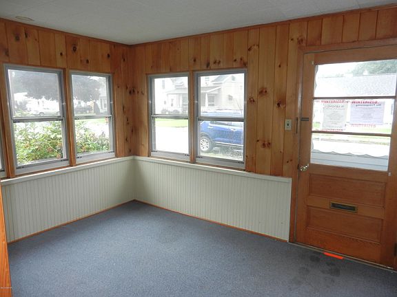 ENCLOSED FRONT PORCH
