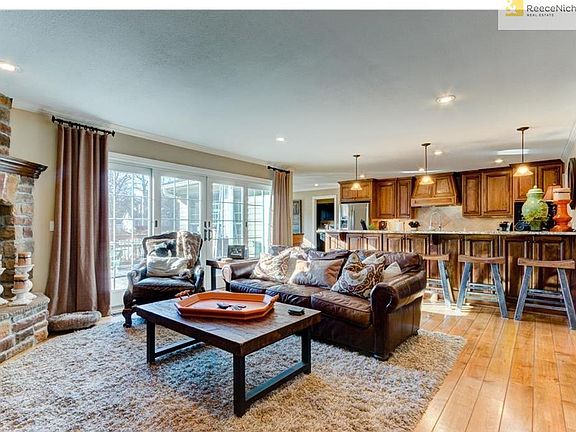 Wide plank wood flooring, beautiful fireplace,  bright and light, custom cabinetry, kitchen open to the family room, everything you want is right here.