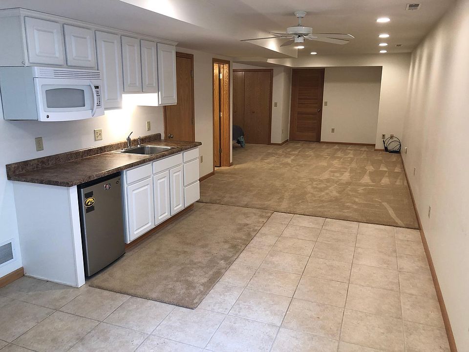 Lower level bedroom with kitchenette and full bathroom.