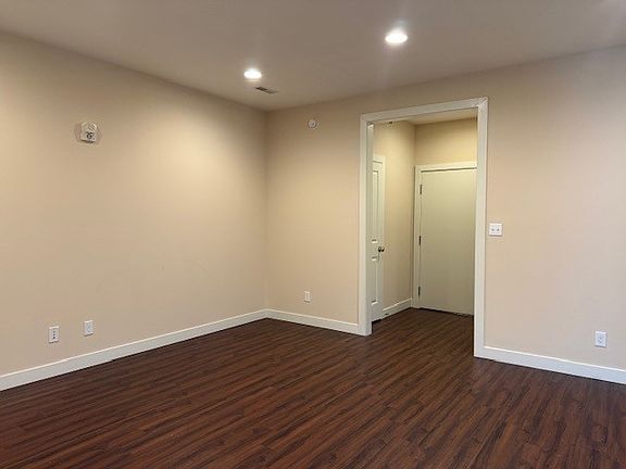 Entry has two coat closets; one on each side of the front door