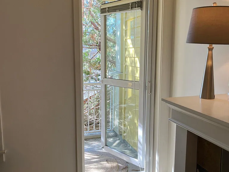 Door to private shaded balcony