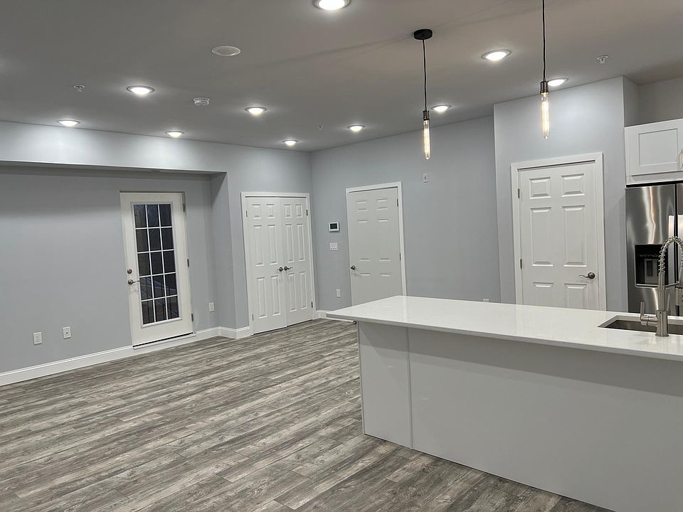 Entryway, Hall Closet, Pantry and One of Two French Balconies