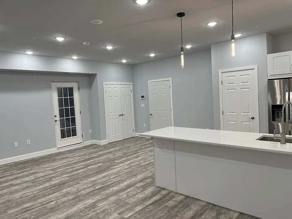 Entryway, Hall Closet, Pantry and One of Two French Balconies
