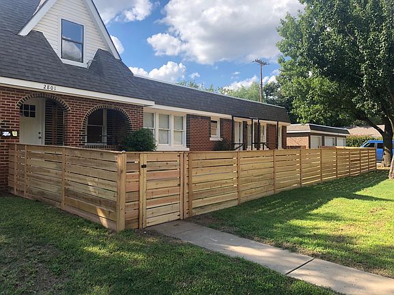 Entry and enclosed yard faces Ross