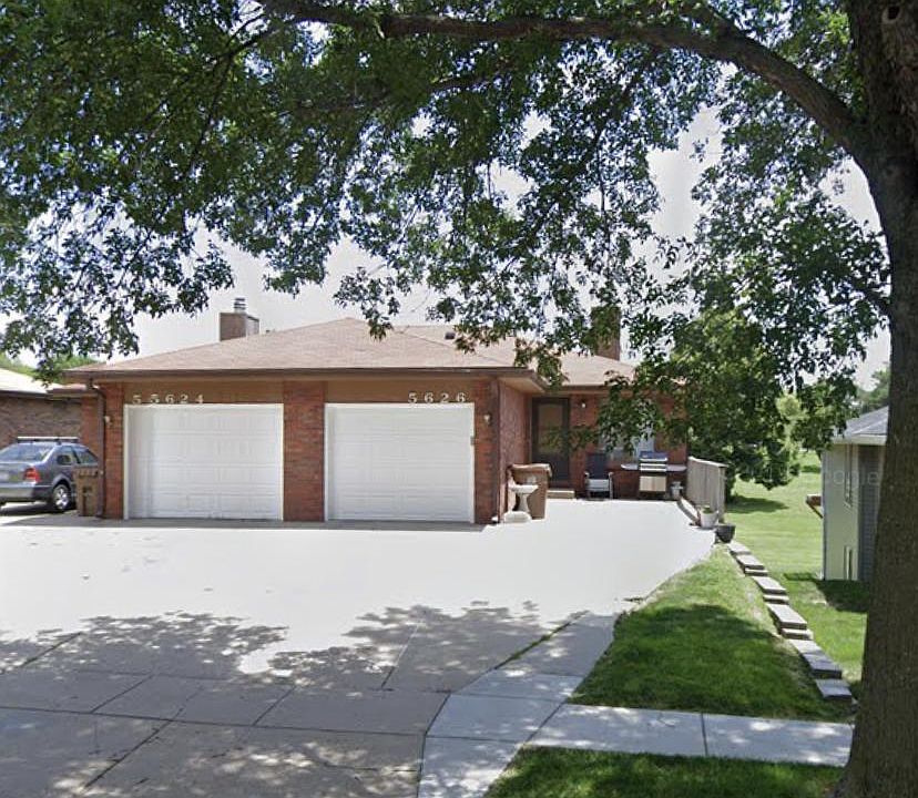 Street view of this duplex facing S 38th Street