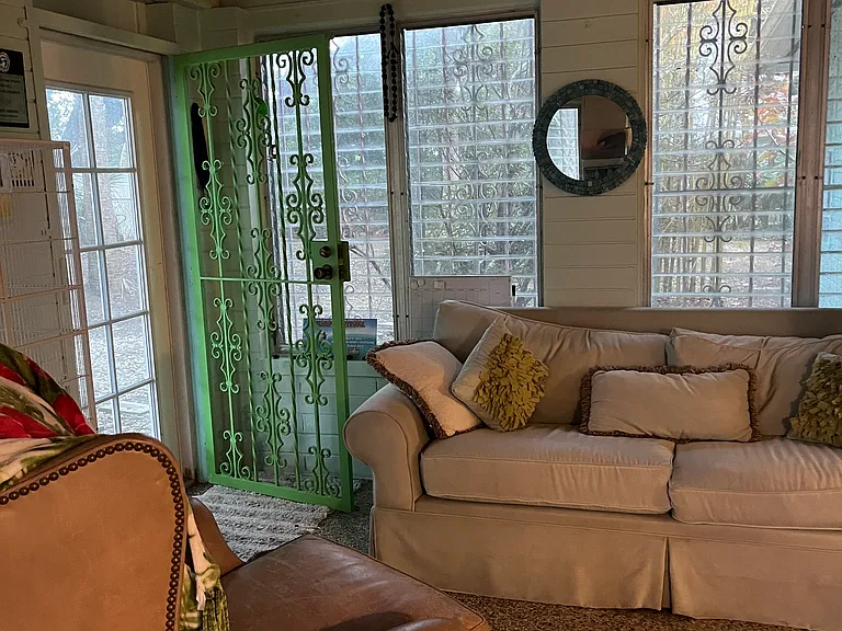 FLorida Room to Backyard for reading and relaxing.