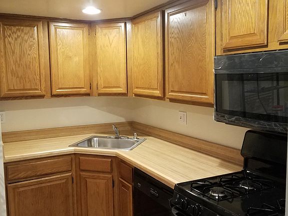 Bright kitchen with recessed lighting, upgraded appliances a