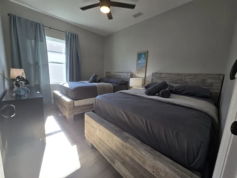2nd bedroom with 2 full sized beds. Both are currently rented. (not furnished)