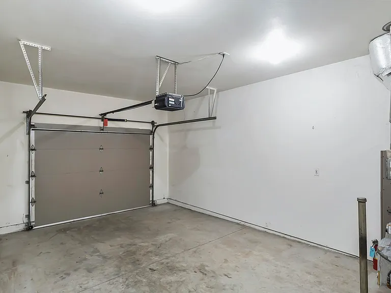 1 car garage with automatic door opener.
