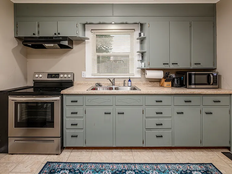 Kitchen is not remodeled but it is clean and functional