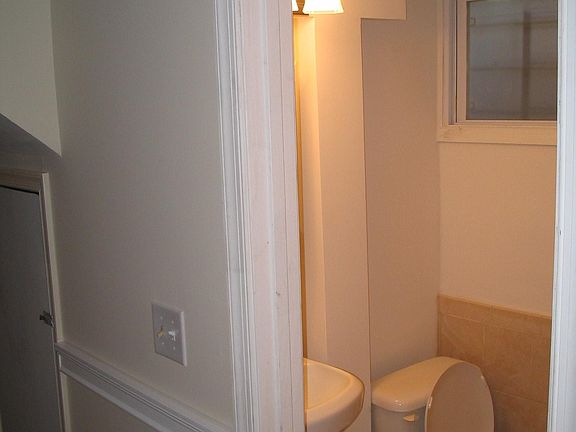 Bathroom with tiled shower