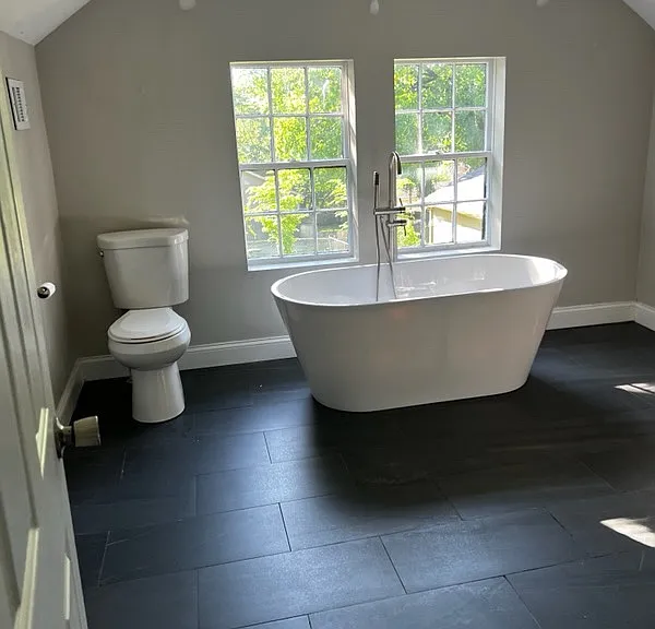 beautiful bathroom overlooking the backyard