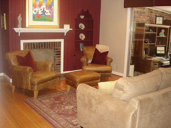 Family room with fireplace and recessed lighting