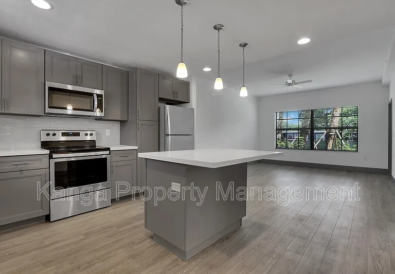 540 NE 14th Ct #103 — Photo 1