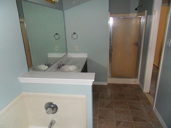 master bath with tub and shower