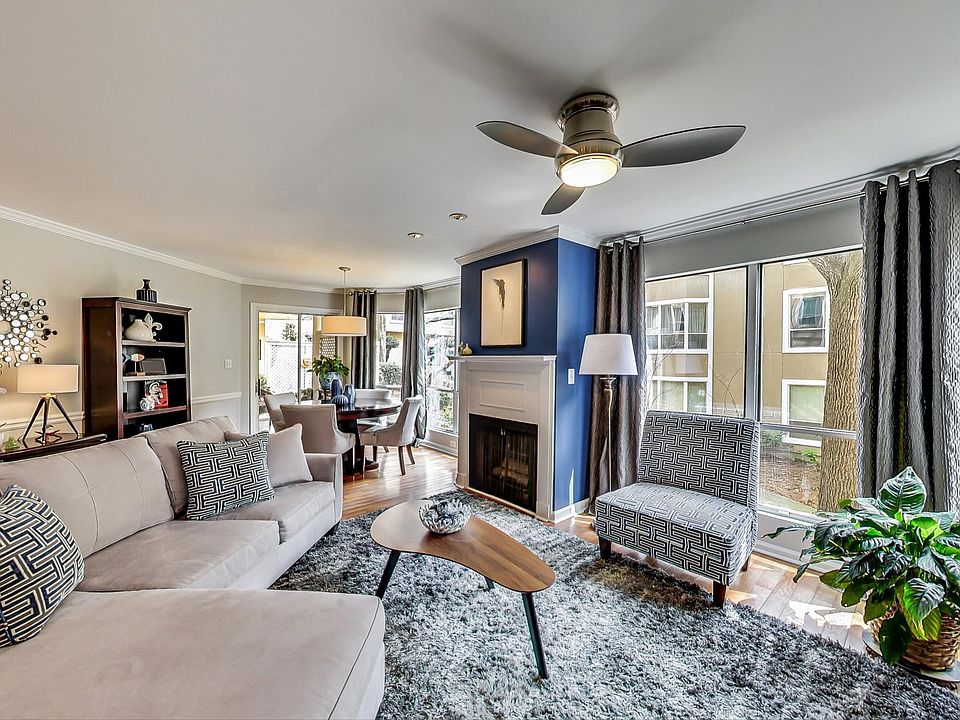 Spacious Living Room with Fireplace

Relax in this expansive living area featuring a cozy fireplace and abundant natural light_perfect for entertaining or unwinding.