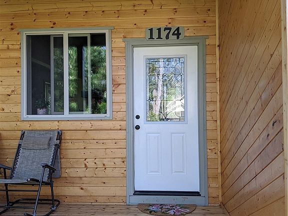 Although it never (ever) rains in the Pacific Northwest, you'll find this covered front porch occasionally useful... especially on rare desert-ray days.