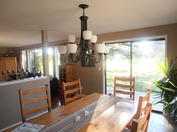 Separate Dining Area that opens to Deck, Yard, and Views