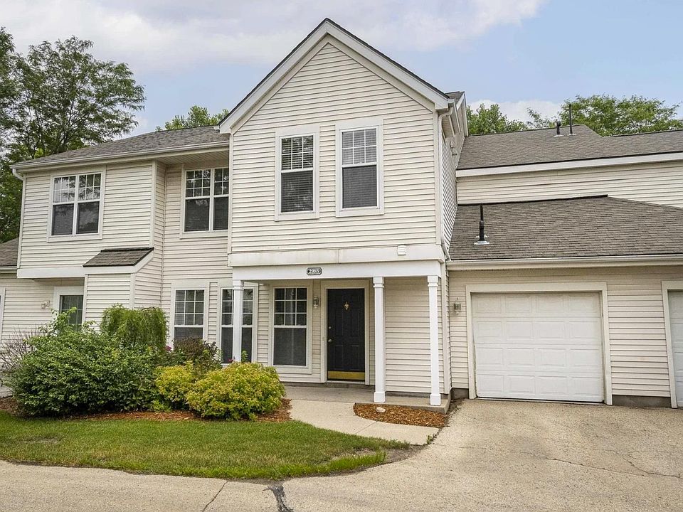 Lighted front entry. Private garage and parking spot.