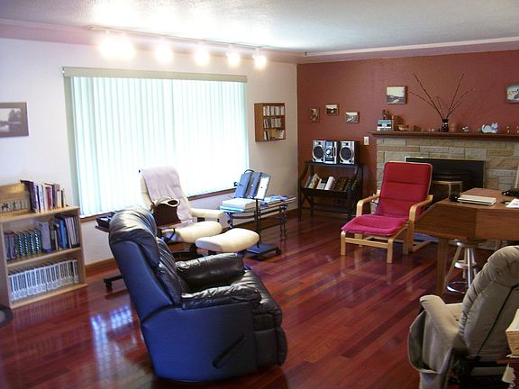 Living room has solid Brazilian cherry floors