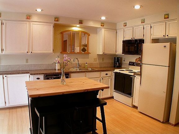 Kitchen features new counters, bamboo floors, space, space & more space.
