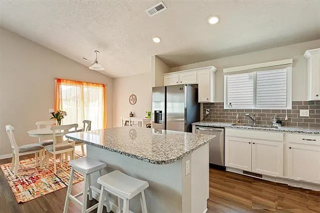 Delightful Kitchen with Stainless steal appliances and granite countertops
