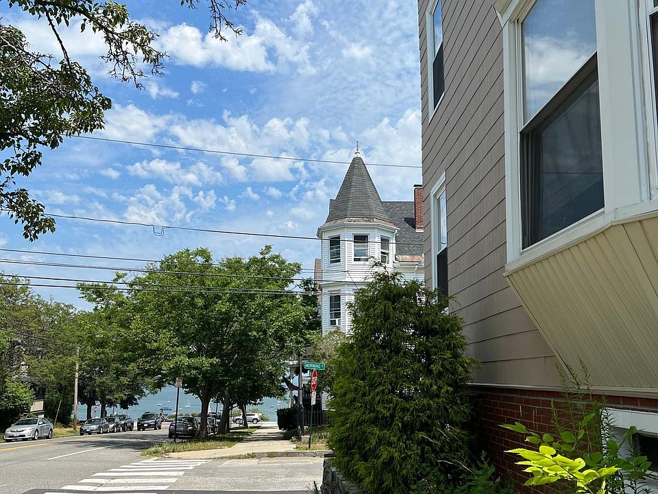 Looking down side of building on Congress to Eastern Prom & ocean.