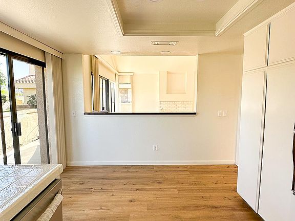 Kitchen looking into living room