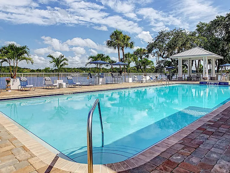 Surrender to leisure amid nature's embrace at our resort-style pool overlooking the serene Alafia River.