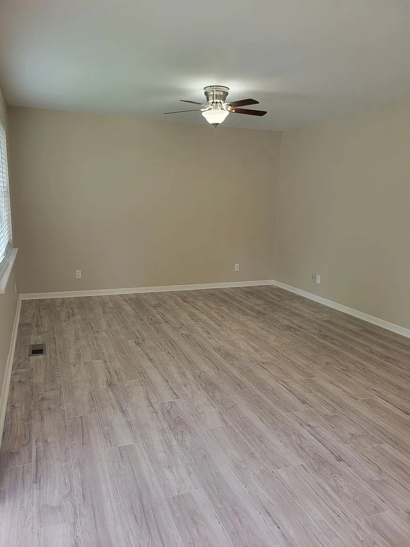 Spacious & Versatile Living in a Prime Location! — Photo 3