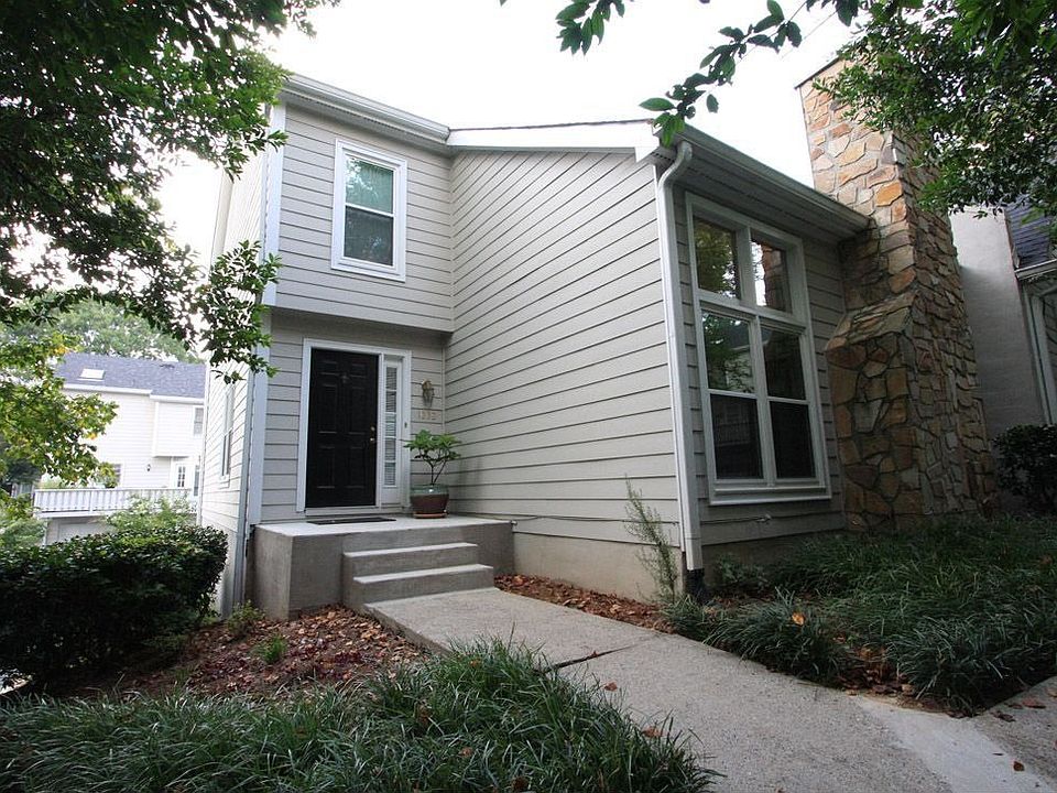 Well renovated John Wieland end-unit offering tons of space and privacy