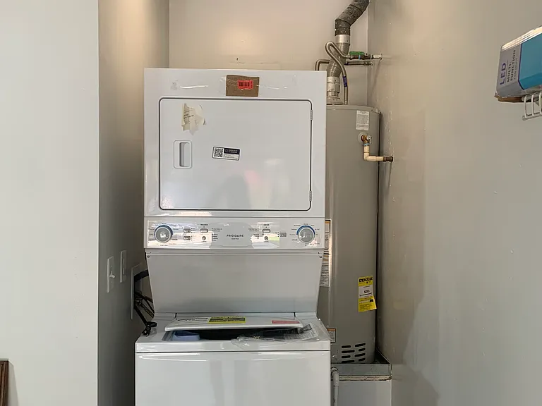 15. BrandNew-Washer-DryerCombo Downstairs in the garage; no hassles of freezing issues