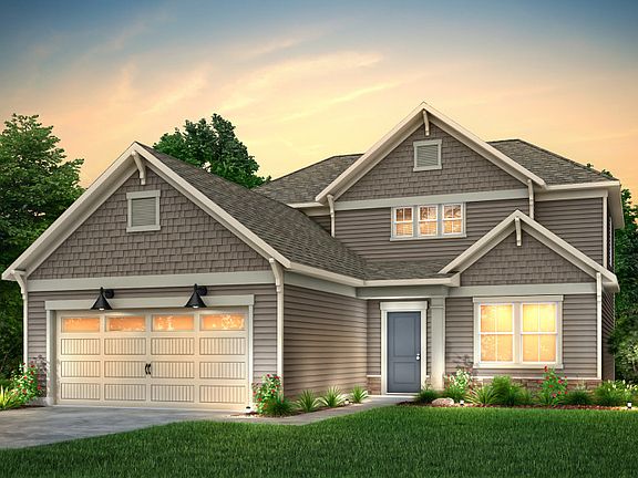 Hartwell Exterior CR104 features shakes, siding, stone, covered front door and 2 car garage