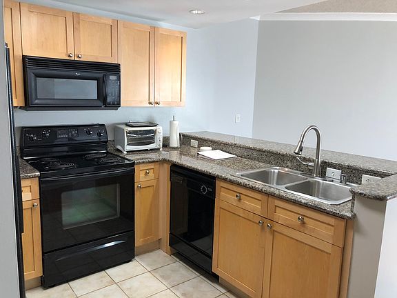 Full size kitchen with bar countertop